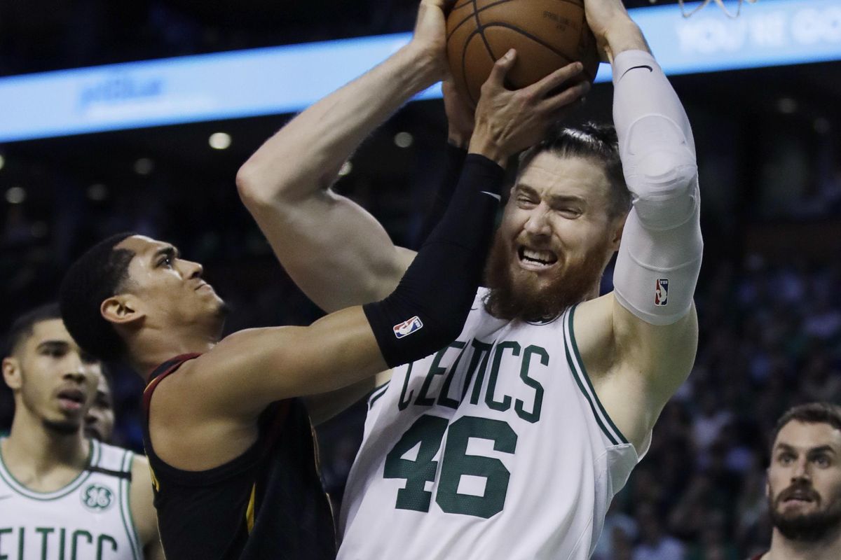 Center Aron Baynes (46) has re-signed with the Boston Celtics. (Charles Krupa / AP)