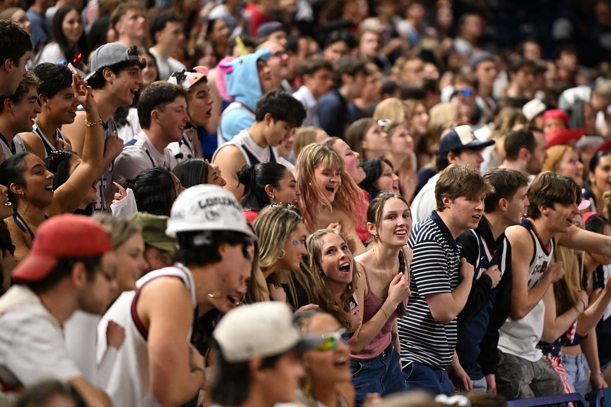 Gonzaga Bulldogs fans cheer for their team against the Portland Pilots during the first half of a basketball game on Feb. 25 at McCarthey Athletic Center.  (Tyler Tjomsland/The Spokesman-Review)