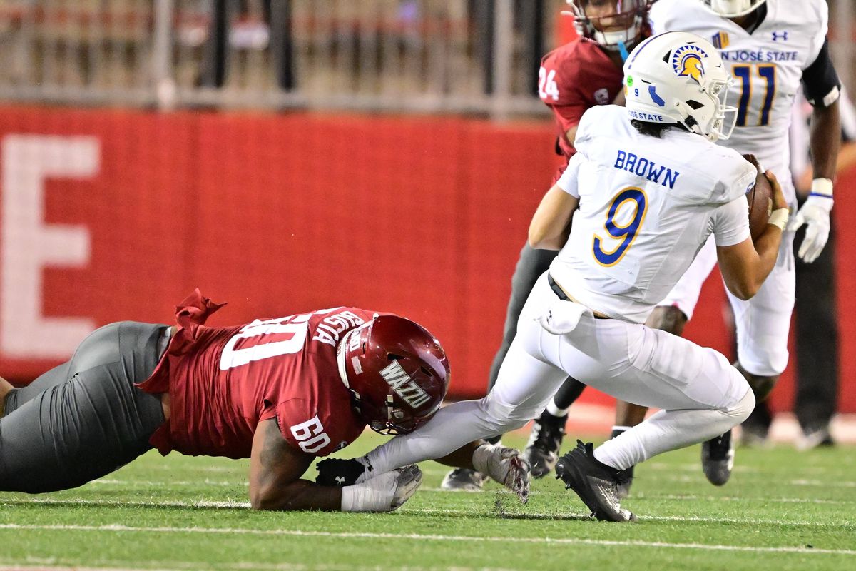 Washington State Cougars defensive tackle David Gusta (60) sacks San Jose State Spartans quarterback Emmett Brown (9) during the second half of a college football game on Friday, Sep. 20, 2024, at Gesa Field in Pullman, Wash. WSU won the game 54-52 in overtime.  (Tyler Tjomsland/The Spokesman-Review)