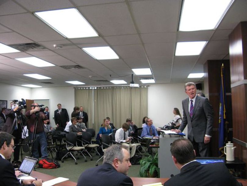 Gov. Butch Otter waits for technical details to be settled for a press conference via the Idaho Education Network on Monday (Betsy Russell)