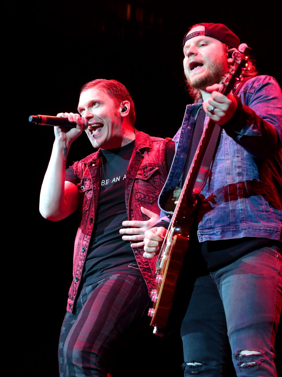 Brent Smith, left, and Zach Myers of Shinedown perform in Camden, N.J., last month. Godsmack and Shinedown are teaming up for a co-headlining tour that comes to Spokane in October. (Owen Sweeney / Invision/AP)