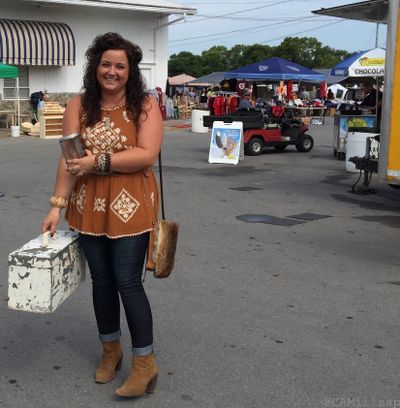 A shopper shows off the vintage tool box she purchased at the Nashville Flea Market. (Photo by Cheryl-Anne Millsap)