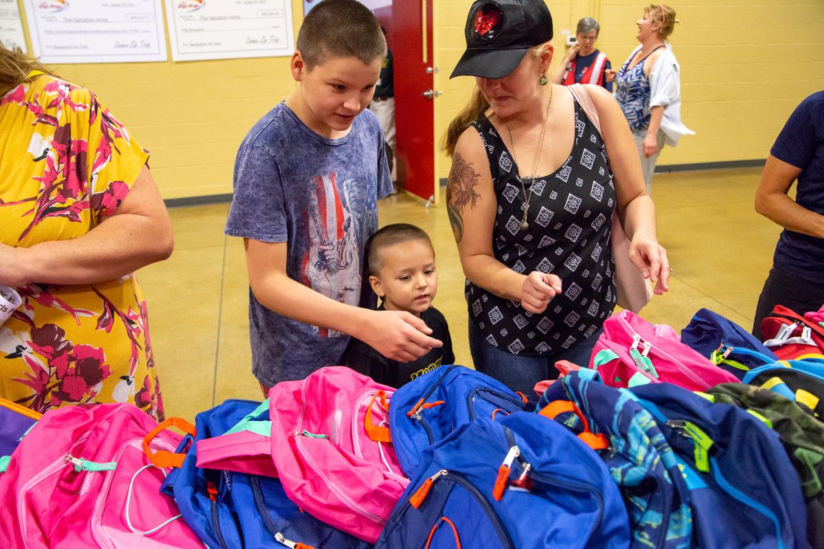 Salvation Army backpack distribution Aug. 15, 2018 The SpokesmanReview