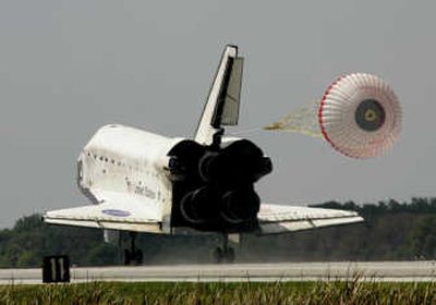 
The shuttle Discovery lands at Kennedy Space Center in Cape Canaveral, Fla., on Saturday. Associated Press
 (Associated Press / The Spokesman-Review)