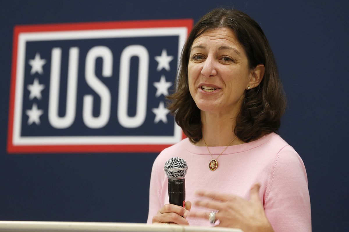 In this Oct. 4, 2019 photo, Rep. Elaine Luria, D-Va., speaks to participants in a USO Pathfinder program in Virginia Beach, Va. Luria has built a reputation as pro-military and proud moderate in one of the nation