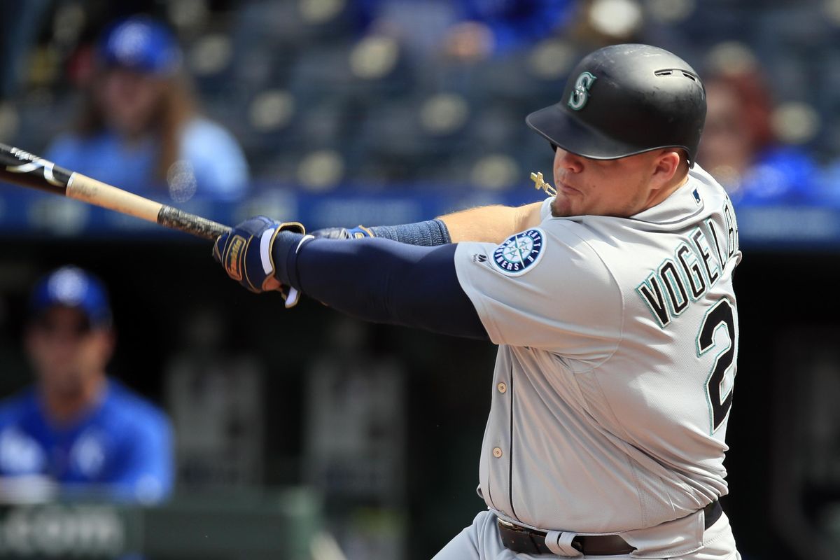 Seattle Mariners designated hitter Daniel Vogelbach hits a solo home run Thursday during the 10th inning against the Kansas City Royals at Kauffman Stadium in Kansas City, Mo.  The Mariners defeated the Royals 7-6 in 10 innings. (Orlin Wagner / AP)