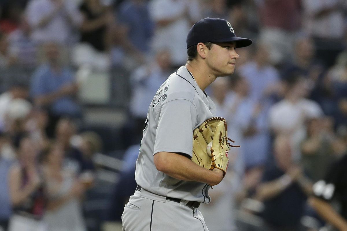 Seattle Mariners starting pitcher Marco Gonzales reacts after giving up his second home run of the fifth inning Tuesday against the New York Yankees at Yankee Stadium in New York. (Seth Wenig / Associated Press)