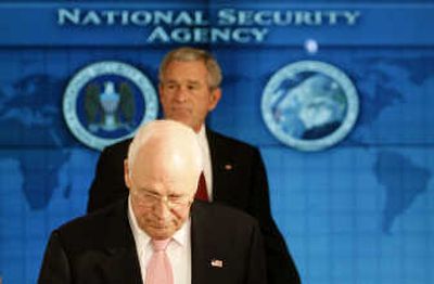 
President Bush, seen with Vice President Dick Cheney  at the National Security Agency in Fort Meade, Md., on Wednesday, called for revisions to the warrantless wiretapping law to be made permanent.Associated Press
 (Associated Press / The Spokesman-Review)