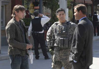 
Jake (Skeet Ulrich, left) helps Beck (Esai Morales, center) prepare for the president's arrival on 