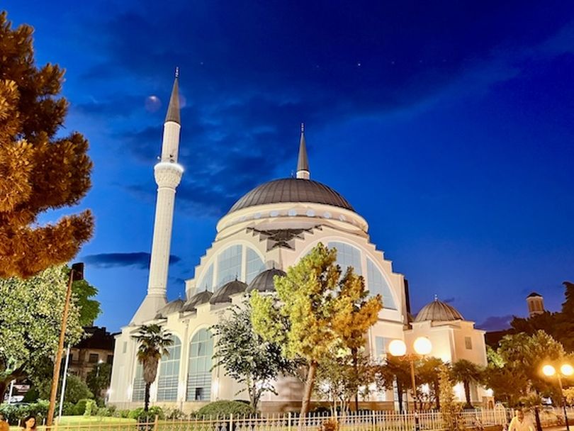 A view of the Ebu Bekēr Mosque is a highlight of an evening stroll through the Albanian city Shkodēr. (Mary Pat Treuthart)