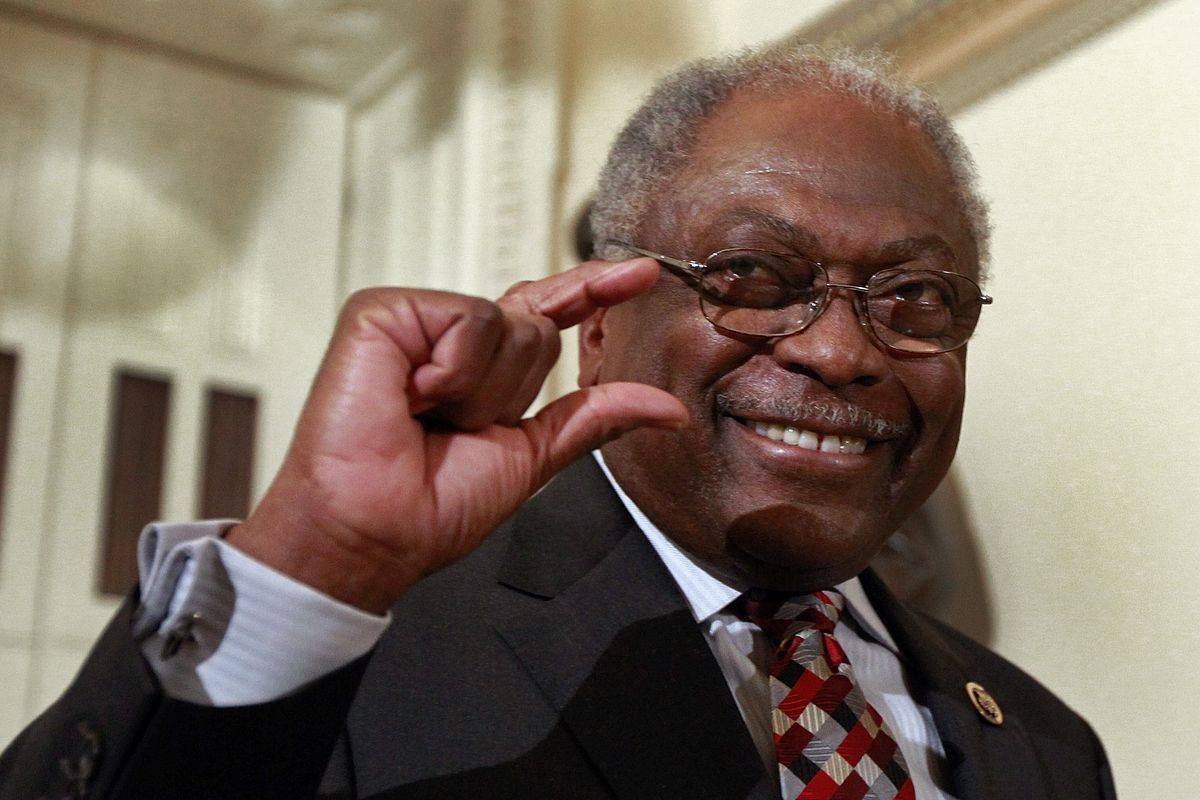 Rep. James Clyburn, D-S.C., guestures as he walks through statuary hall as the House prepares to vote on health care reform in the U.S. Capitol in Washington on Sunday, March 21, 2010. (Alex Brandon / Associated Press)