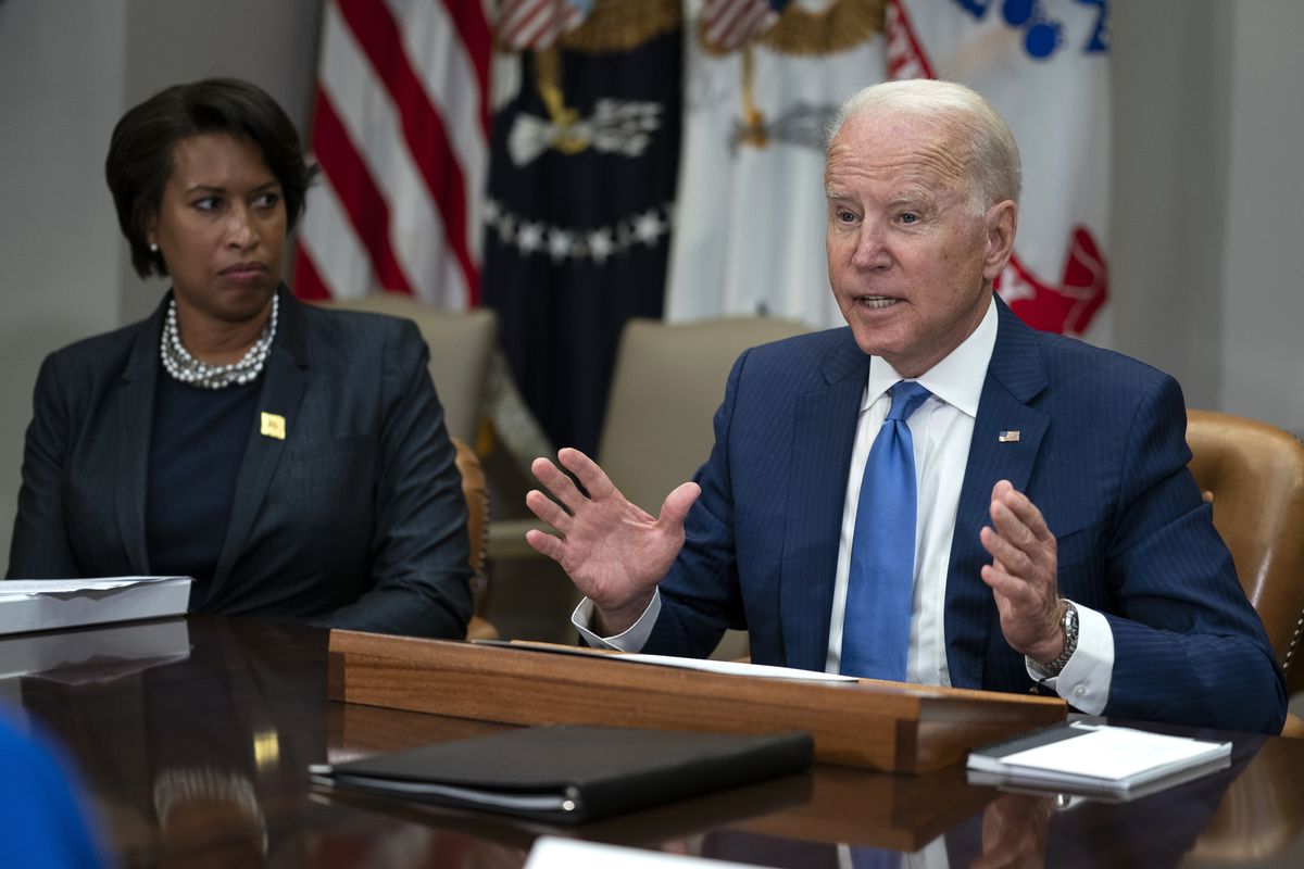 Washington Mayor Muriel Bowser listens as President Joe Biden speaks during a meeting on reducing gun violence, in the Roosevelt Room of the White House, Monday, July 12, 2021, in Washington.  (Evan Vucci)