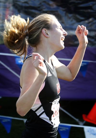 North Central’s Katie Knight shows her happiness Saturday after crossing the line first at the State 3A cross country meet. (ANDY SAWYER)