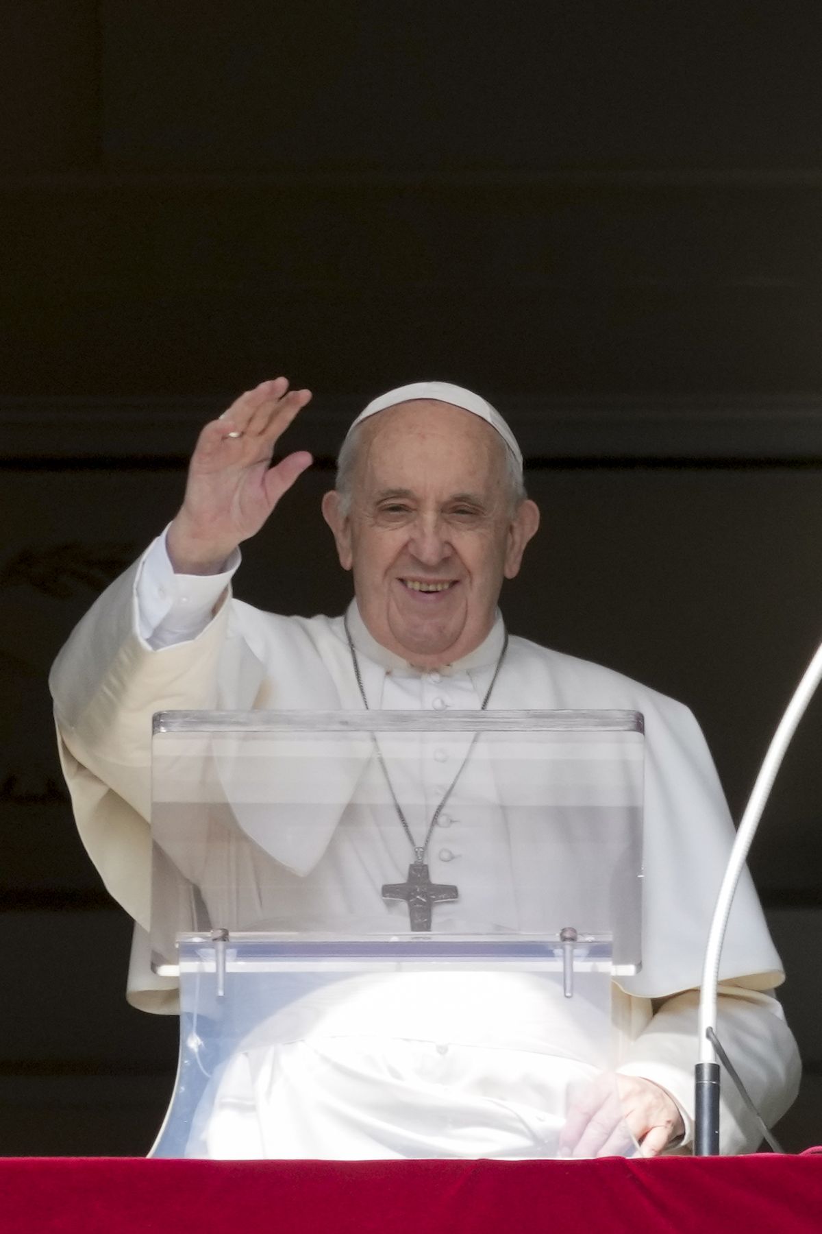 Pope Francis delivers his blessing as he recites the Angelus noon prayer from the window of his studio overlooking St.Peter's Square, at the Vatican, Sunday, Oct. 24, 2021. (Andrew Medichini)