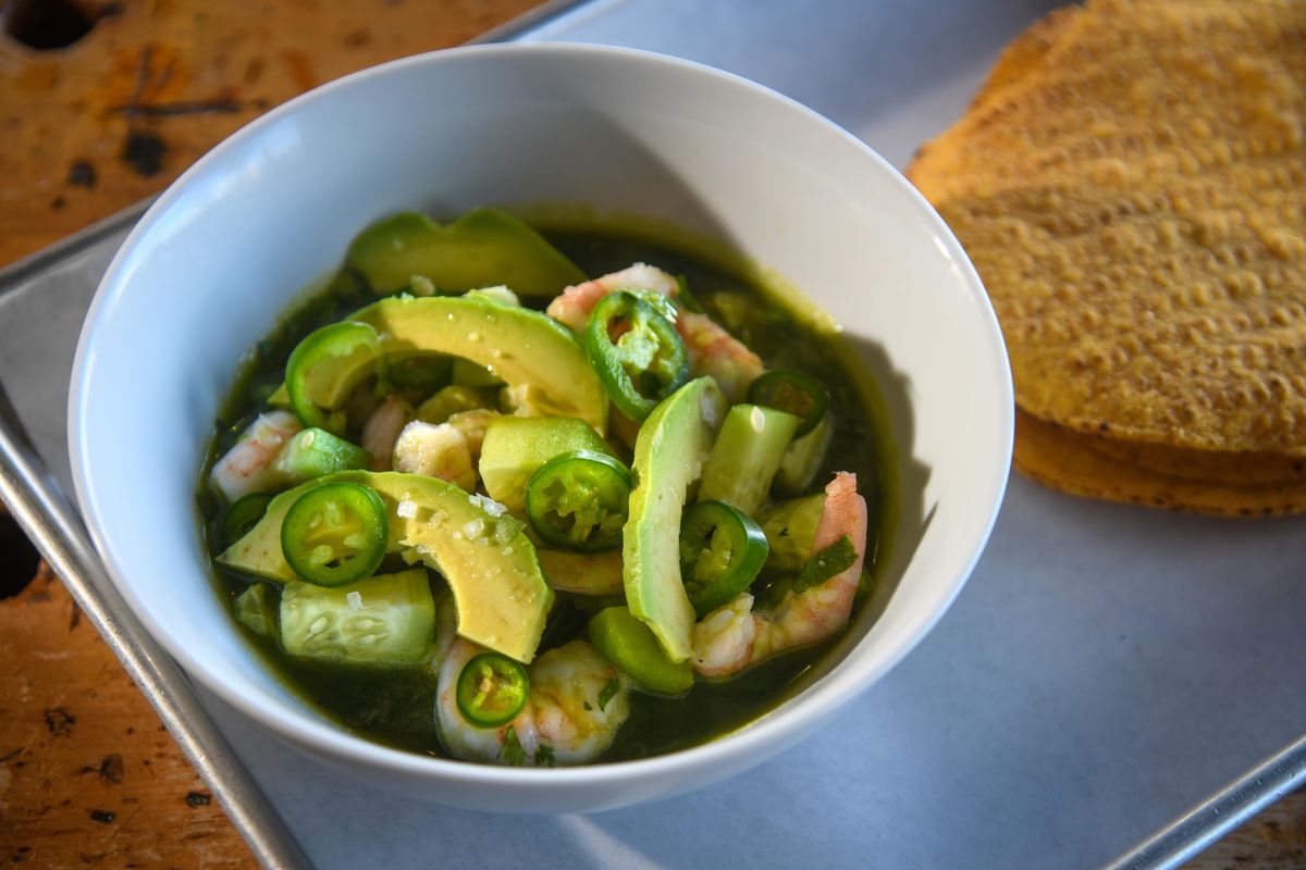 Chad White created his Agua Chile Verde ceviche with shrimp, cilantro, avocado, chiles and cucumber. (Dan Pelle / The Spokesman-Review)