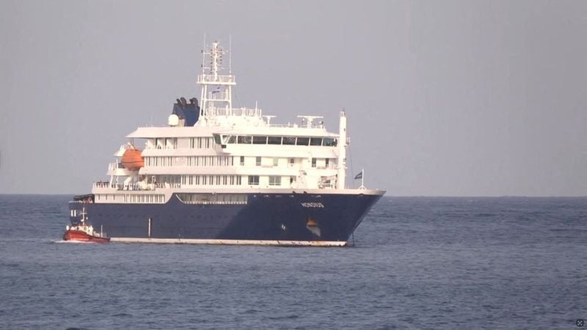 A boat is seen in a video Tuesday beside cruise ship MV Hondius anchored off Cape Verde port, on the day sick passengers were evacuated by boat from the cruise ship, in Praia Port, Cape Verde.  (Reuters TV)
