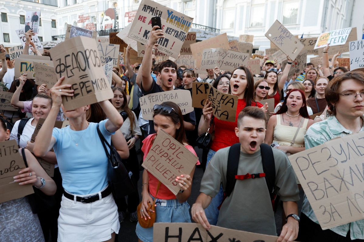 People protest Friday against Ukrainian President Volodymyr Zelenskyy’s decision to replace Mykhailo Fedorov as defense minister in Kyiv, Ukraine.  (Reuters)
