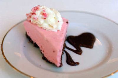 
 This recipe for Candy Cane Cheesecake has 75 percent less saturated fat than the traditional.
 (Photo courtesy of Elaine Magee / The Spokesman-Review)
