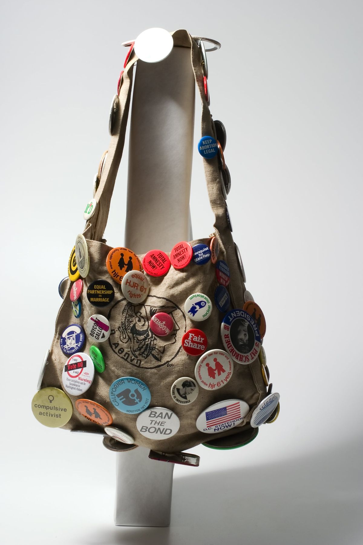 Marion Moos’ Political Button Bag from the 1970s, filled with slogans advocating for the Equal Rights Amendment and women’s rights.  (Courtesy of the MAC)