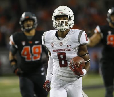 Washington State receiver Tavares Martin Jr. (8) beats the Oregon State defense to the end zone for a touchdown during the first half of an NCAA college football game in Corvallis, Saturday, Oct. 29, 2016. (Timothy J. Gonzalez / Associated Press)