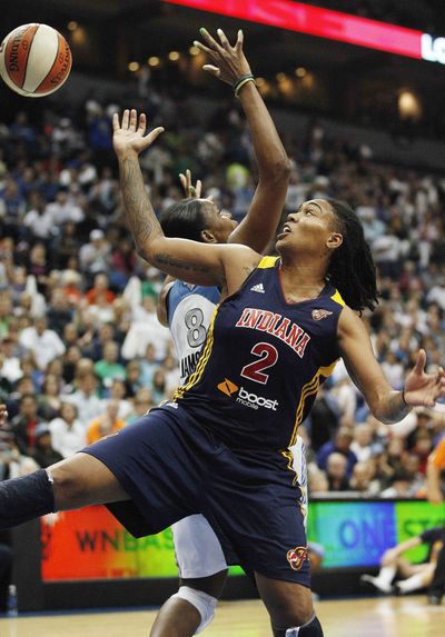 Indiana Fever forward Erlana Larkins (2) fights for a rebound. (Associated Press)