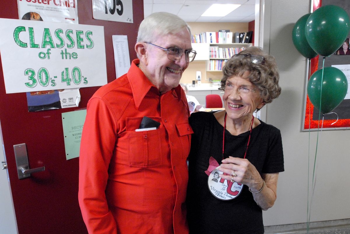 Lee Thach and Virginia Dunbar Holmes, both 1938 North Central graduates, joke about old times Saturday at the school’s 100th anniversary celebration.  (Jesse Tinsley / The Spokesman-Review)