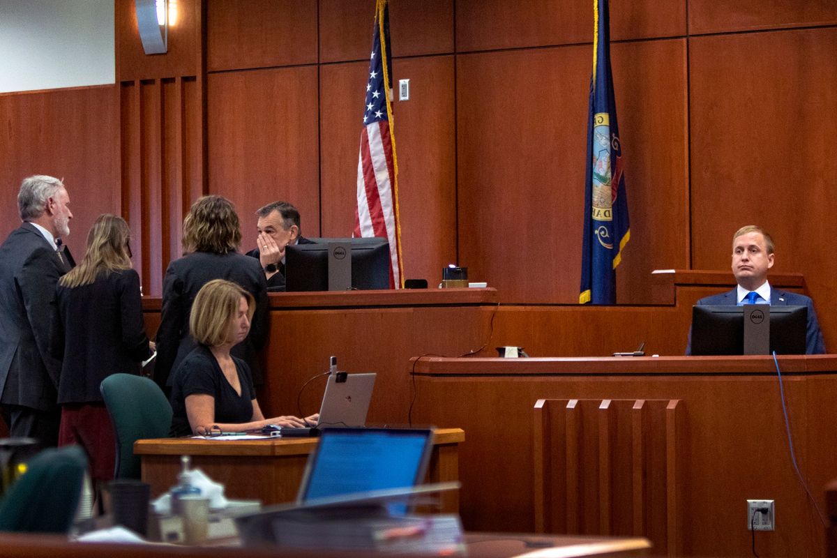 District Judge Michael Reardon confers with attorneys during the second day of testimony in the rape trial of former Idaho state Rep. Aaron von Ehlinger, right, at the Ada County Courthouse on Thursday in Boise.  (Brian Myrick)