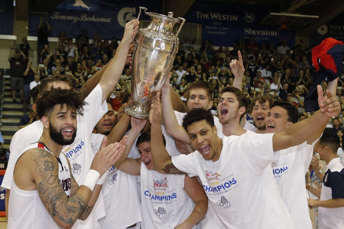 Gonzaga players hold the trophy after they defeated Duke 89-87  to win the Maui Invitational on  Nov. 21 in Lahaina, Hawaii. (Marco Garcia / AP)