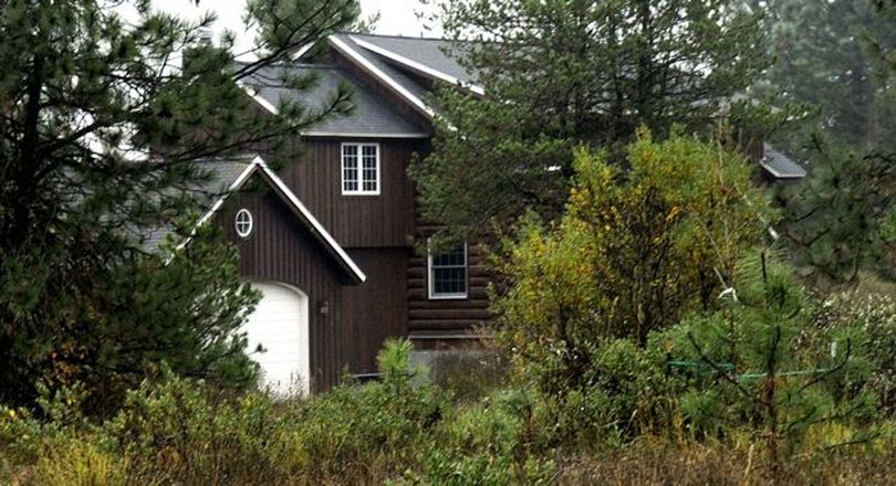 Rep. Phil Hart's Athol home, built in part with logs cut illegally from Idaho school endowment lands (Kathy Plonka)