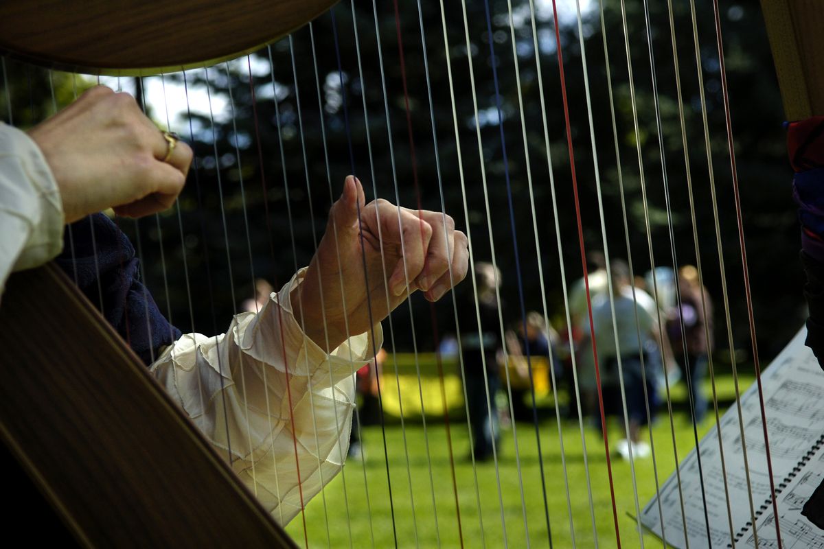 Harp player Lyndee Stelling is slated to return to the Children’s Renaissance Faire at Manito Park on Saturday. (File)