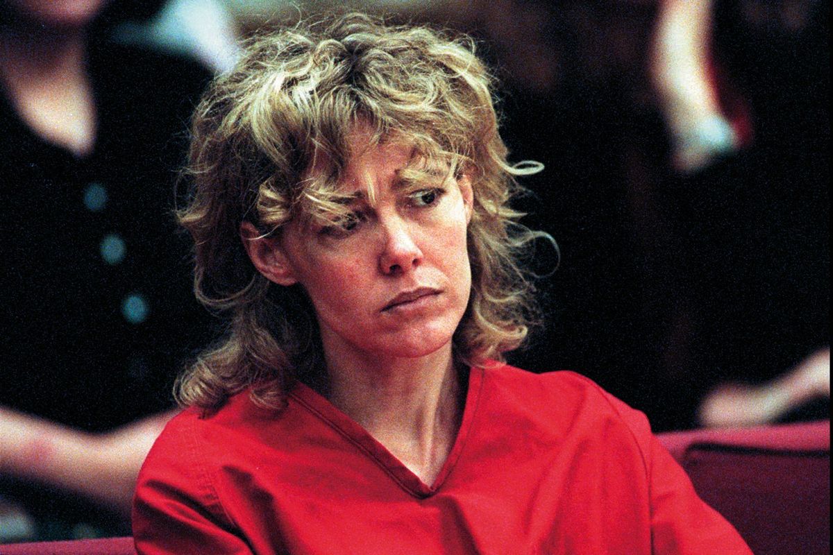 FILE - In this Feb. 6, 1998, file photo, Mary Kay Letourneau listens to testimony during a court hearing in Seattle Letourneau, who married her former sixth-grade student after she was convicted for raping him, has died. She was 58. Her lawyer David Gehrke told news outlets Letourneau died Tuesday, July 7, 2020, of cancer. The former suburban Seattle teacher was arrested in 1997 after she became pregnant with Vili Fualaau