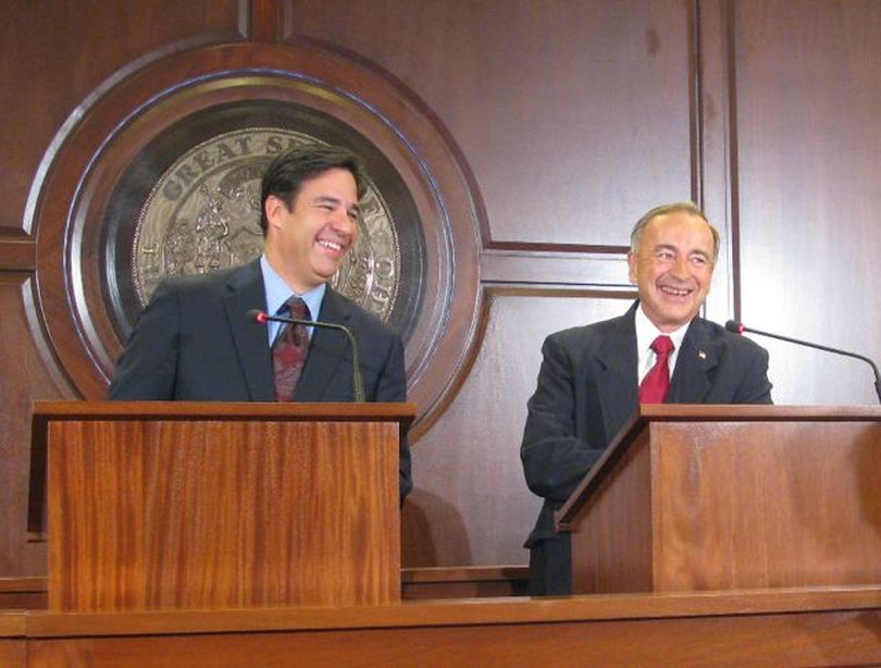 Raul Labrador, left, and Walt Minnick, right, smile before they debate on Idaho Public TV on Oct. 14. (Betsy Russell)