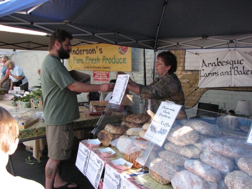 Louise Tuffin from Arabesque Farms and Bakery sells organic bread at the South Perry Farmers' Market on Thursdays from 3-7 p.m. (Pia Hallenberg)