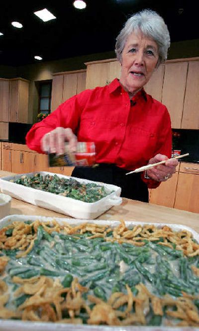 
A Green Bean Cassorole sits in the foreground as Dorcas Reilly prepares another five at the Campbell Soup Co. corporate kitchen in Camden, N.J.. Reilly, a Campbell Soup kitchen supervisor in 1955, was the driving force behind the dish, company officials say. 
 (Associated Press / The Spokesman-Review)