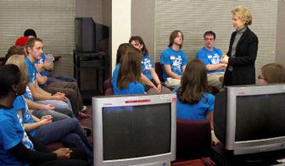 
Washington Gov. Christine Gregoire speaks with a group of about two dozen students on Wednesday in the library at University High School. They discussed a project the school took on to generate awareness about war atrocities and genocide. The governer praised the students and the work they've done within the school. 
 (Photo courtesy Melanie Rose. / The Spokesman-Review)