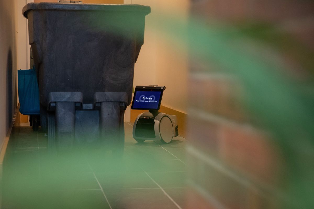 Astro, an AI robot created by Amazon, maps the lobby of the University of Washington Law School