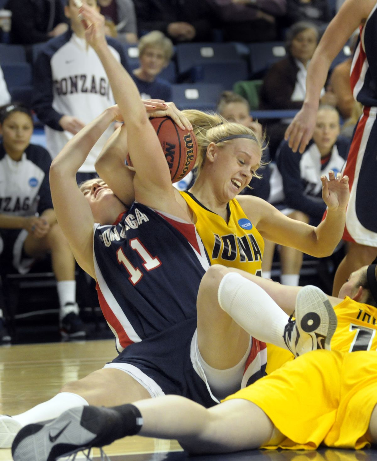 Gonzaga’s Janelle Bekkering, left, fights for a loose ball on the floor during first-half action Saturday. (Christopher Anderson)