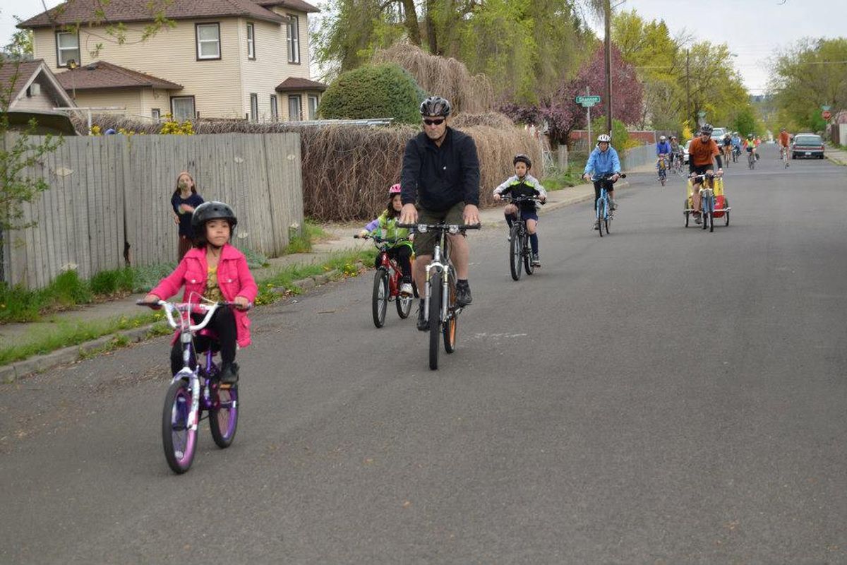 Riders participate in the West Central Kidical Mass in 2013. (Hank Greer)