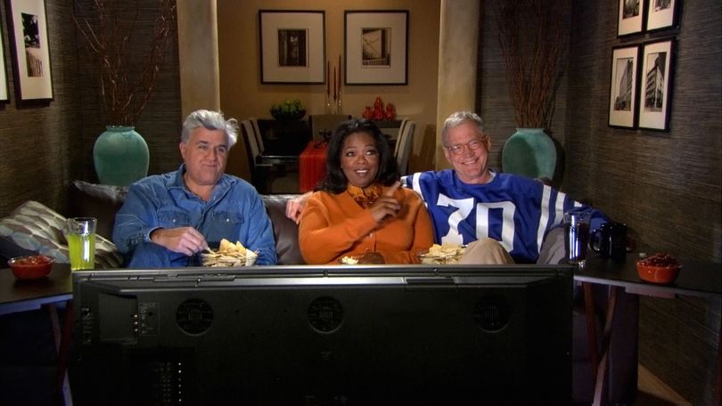 FILE - In an file photo from video provided by CBS, David Letterman, Oprah Winfrey and Jay Leno, from right, record a promo for CBS' 