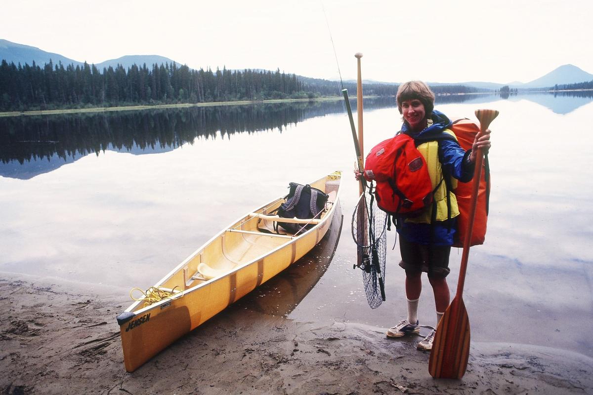 Meredith Heick shows her single-portage style during a paddling trip in British Columbia’s Bowron Lakes.  (Rich Landers/For The Spokesman-Review)