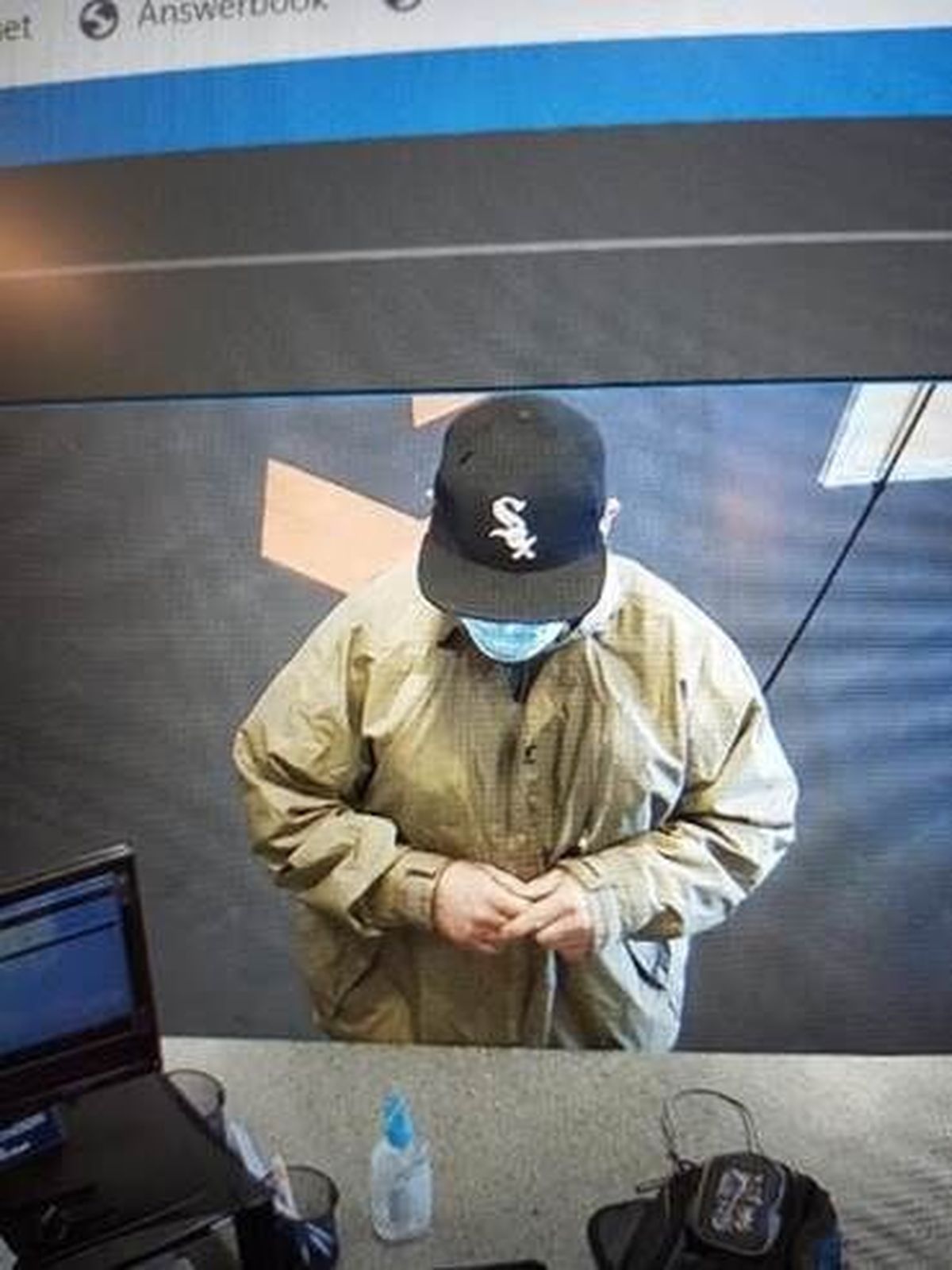 Police are looking for this man who is suspected of robbing a credit union Wednesday in East Central Spokane.  (Courtesy of Spokane Police Department)