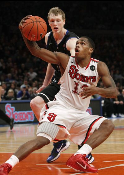 Guard Dwight Hardy (12) is the leading scorer for St. John’s at 18 ppg. (Associated Press)
