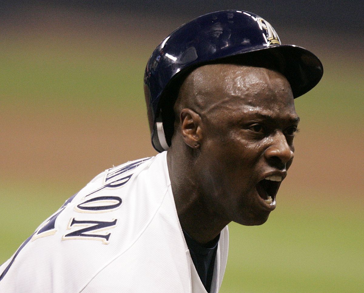 Milwaukee’s Mike Cameron reacts after sliding safely into third base during the fifth inning.  (Associated Press / The Spokesman-Review)