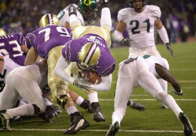 
Sampson led UW backs in TDs in 2003 with eight, including this one against Oregon. 
 (Associated Press / The Spokesman-Review)