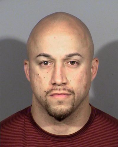 This undated photo provided by Clark County Detention Center shows Las Vegas police officer Kenneth Lopera. (Clark County Detention Center / Associated Press)