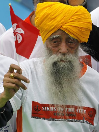 Centenarian marathon runner Fauja Singh didn’t take up the sport until he was 89 years old. (Associated Press)