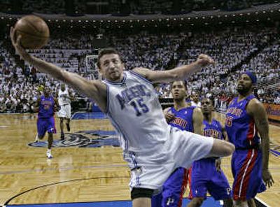 
Detroit's defense was pretty much nonexistent as Orlando Magic forward Hedo Turkoglu slices to the basket. Associated Press
 (Associated Press / The Spokesman-Review)