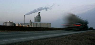 
A tanker truck carrying 7,700 galons of ethanol blurs past the East Kansas Agri-Energy ethanol plant in Garnett, Kan.  
 (Associated Press / The Spokesman-Review)