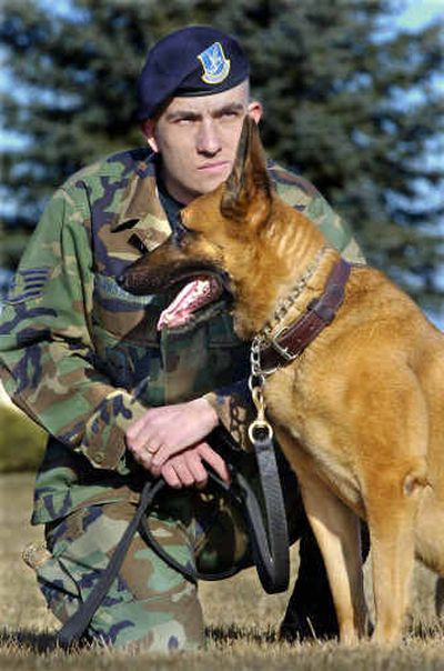 Staff Sgt. Joshua Farnsworth and Eesau take a break during training at the 92nd Security Forces Squadron at Fairchild Air Force Base.
(Photos by Christopher Anderson/ / The Spokesman-Review)