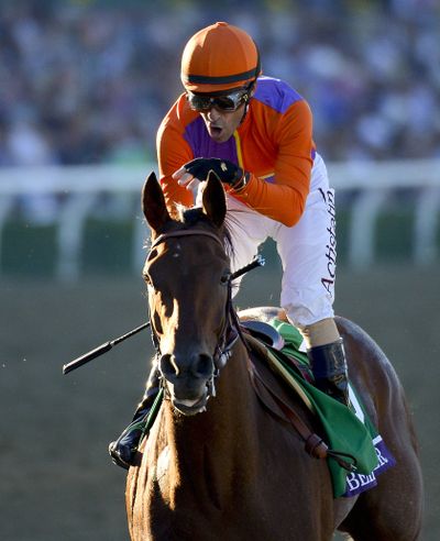 Gary Stevens rode Beholder to a 4½-length victory at the Breeders’ Cup Distaff. (Associated Press)